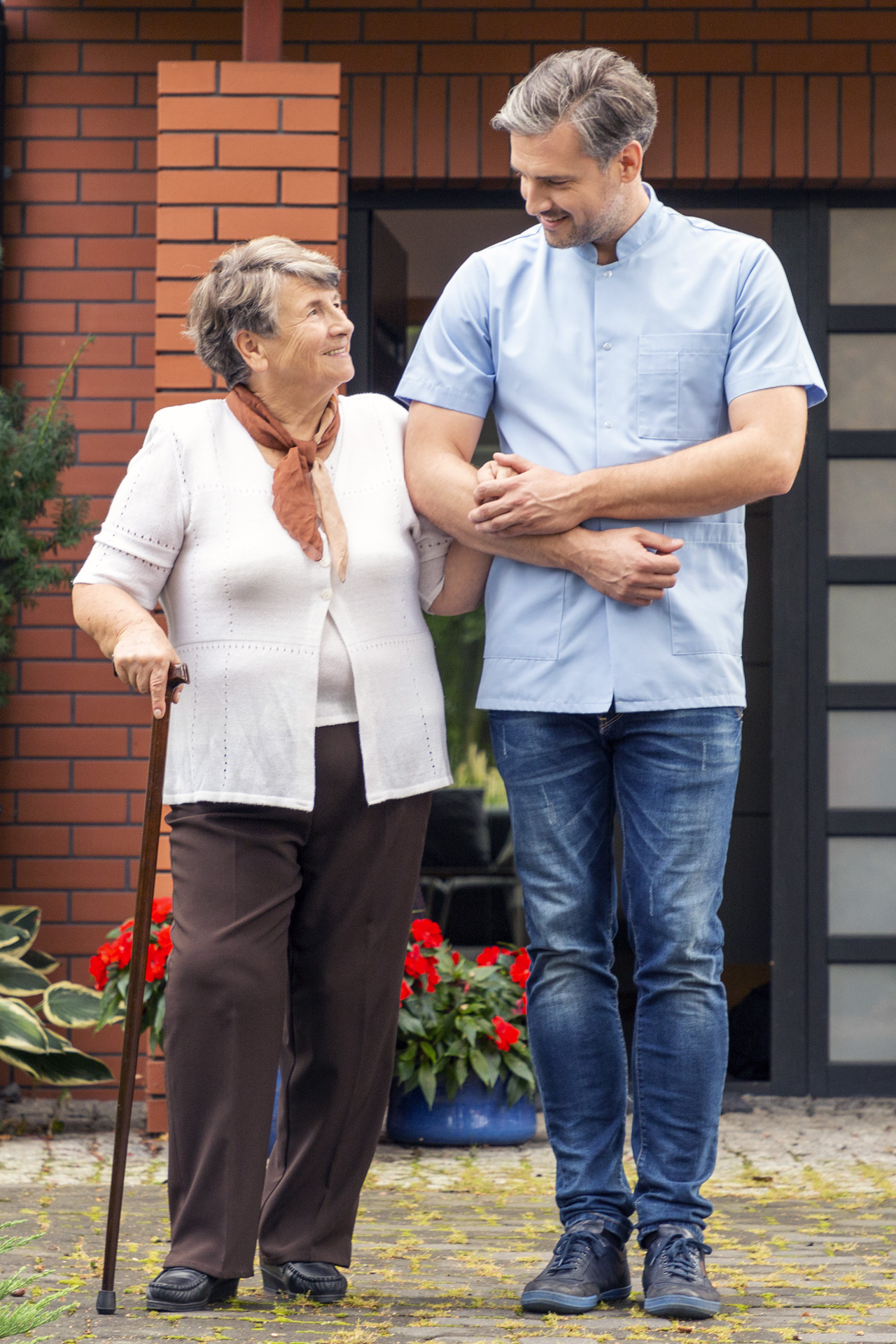 Patient and Nurse walking together