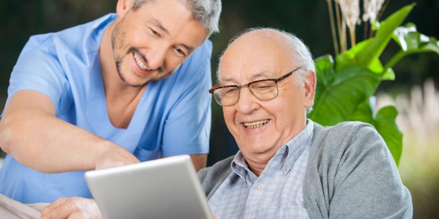 Nurse and Patient using iPad together